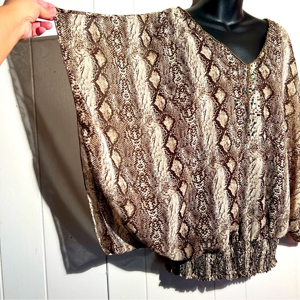 Animal print Size 1x Blouse in brown and tan.